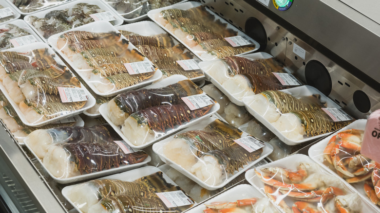 lobster tails crabs on display