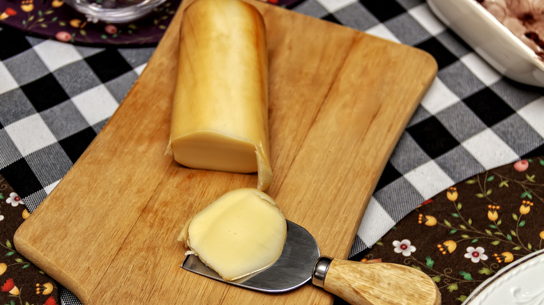 A slice of smoked provolone cheese