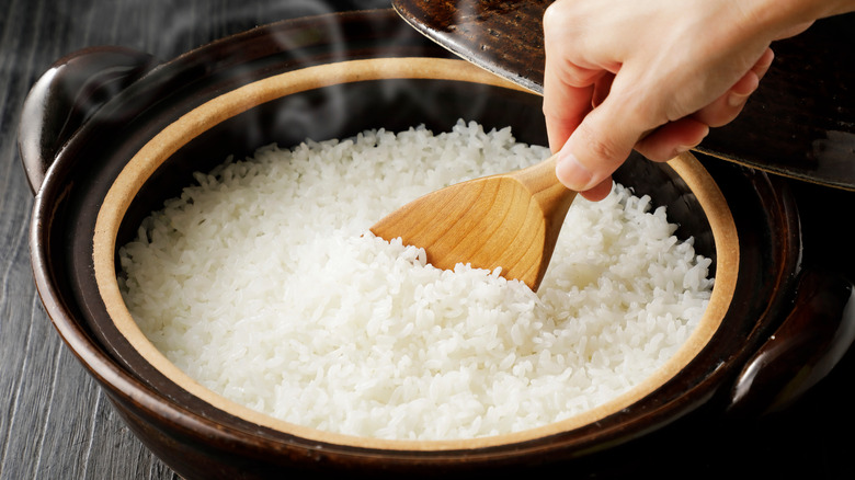 steaming rice in pot