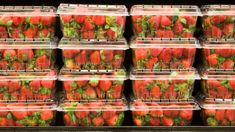 plastic containers of strawberries