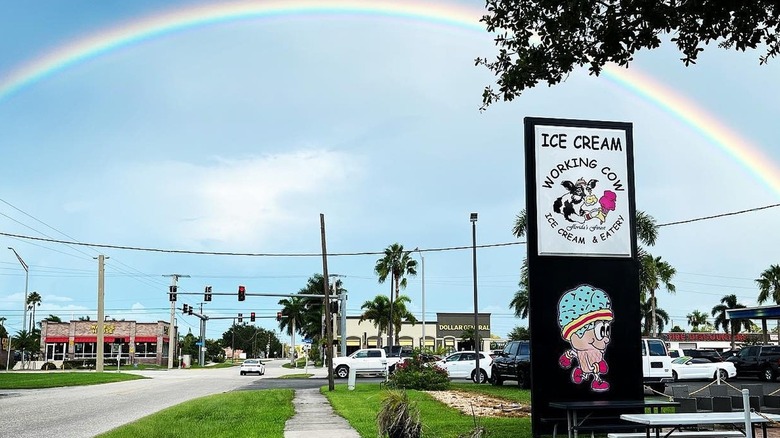 Working Cow ice cream sign outside Florida business with rainbow