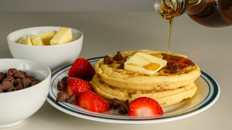 waffles with syrup and strawberries