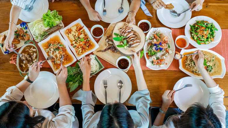 Group eating Thai food