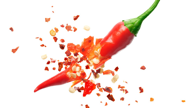 Broken cayenne pepper with seeds