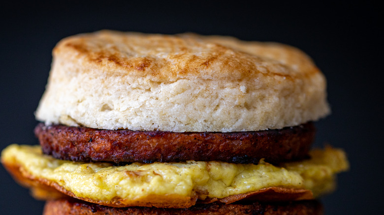 Close-up of egg and sausage biscuit
