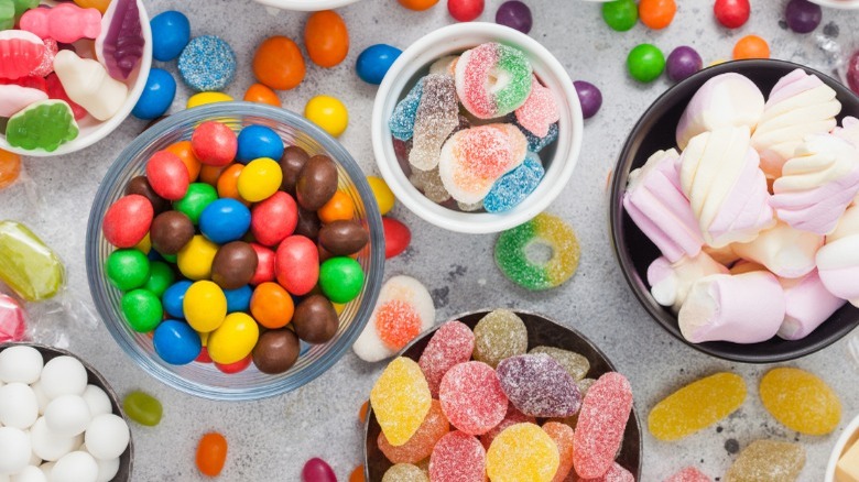 assorted candy in bowls
