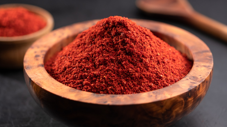 Wooden bowl of paprika