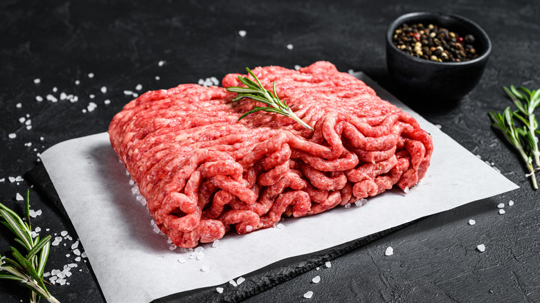 Ground pork on cutting board
