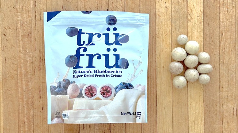 Package and pieces of Nature's Blueberries Hyper-Dried in Crème
