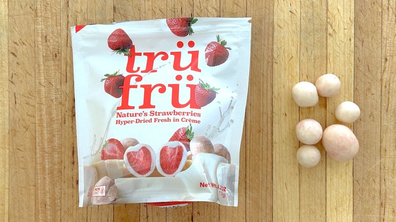 Package and pieces of Nature's Strawberries Hyper-Dried in Crème