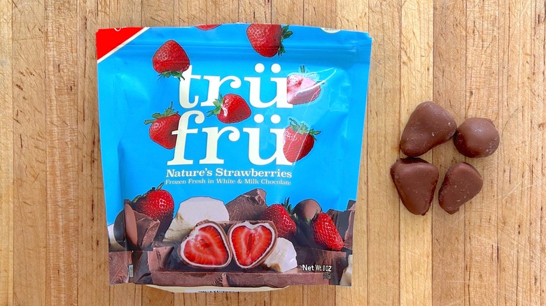 Package and pieces of Nature's Strawberries Hyper-Chilled in White and Milk Chocolate