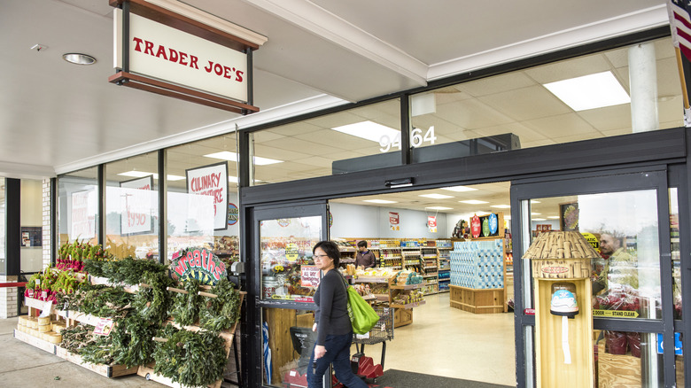 shopper leaving a trader joe's