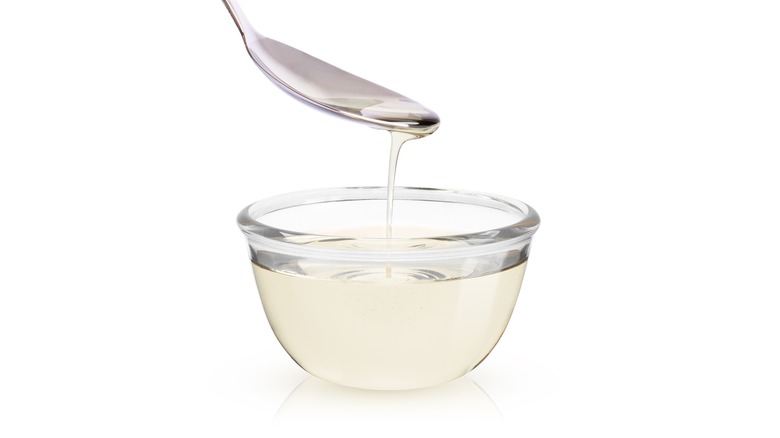sugar syrup dripping from spoon