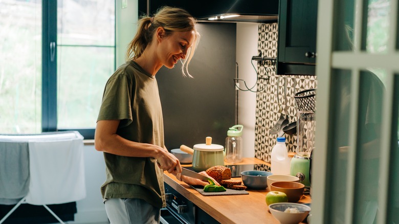 Person chopping fresh ingredients