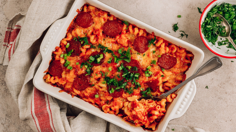 Pizza casserole with herb garnish