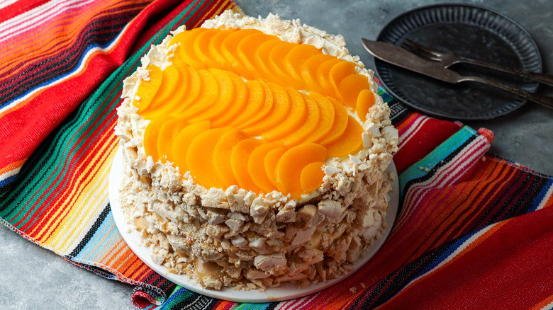 cake topped with orange fruit