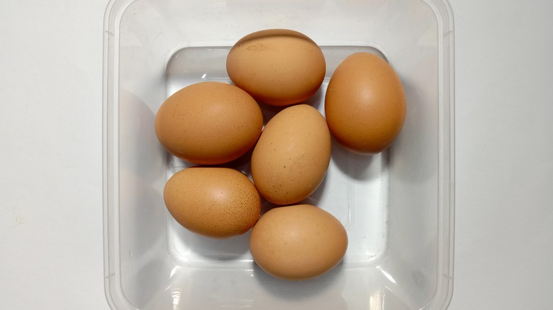 eggs in plastic container