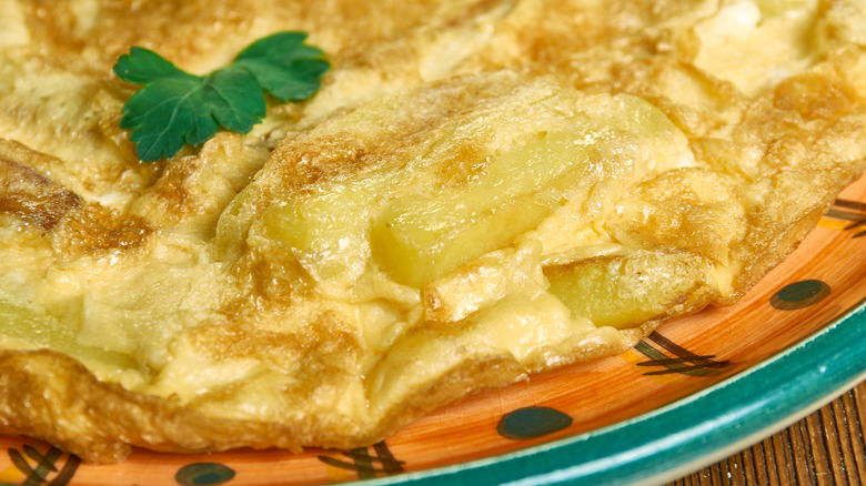 Freshly-cooked chipsi mayai