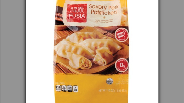 a bag of frozen Fusia Pork Potstickers against a white background.