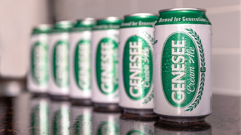 A row of Genesee Cream Ale cans