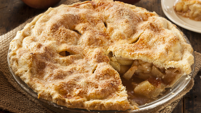 Apple pie with slice cut