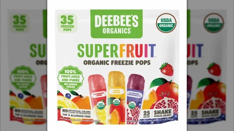view of a box of DeeBee's Super Fruit Organic Freeze Pops with a variety of flavors displayed.
