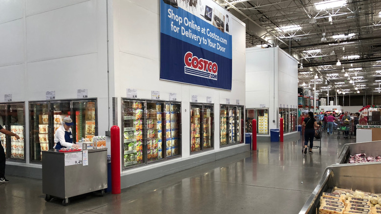 an interior view of Costco looking towards the beginning of the frozen food aisles.