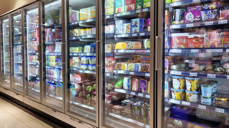 A view of the ice cream freezer row in a grocery store.