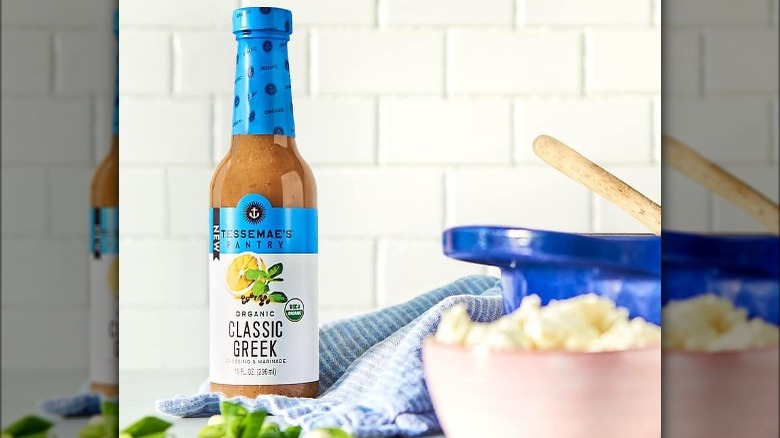 Tessemae's Greek dressing on table
