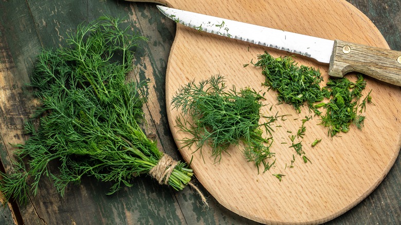Fresh dill on cutting board