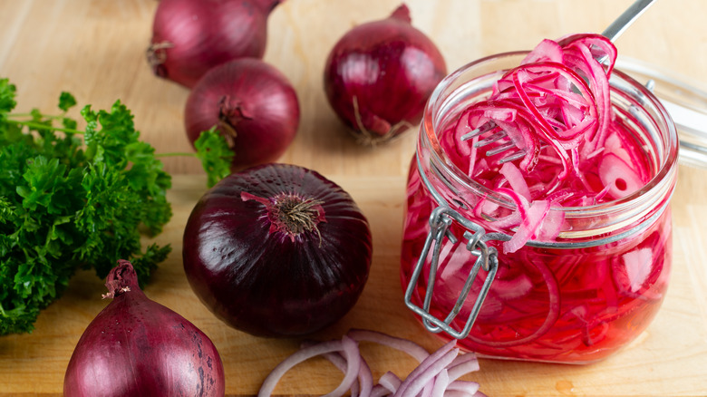 Pickled red onions in jar