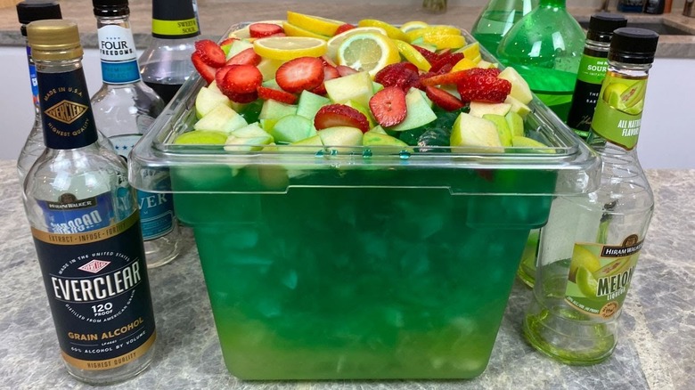 a tub of jungle juice sits
