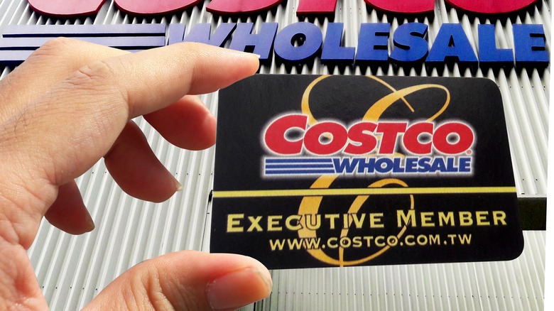 Close up of hand holding Costco membership card for Taiwan location