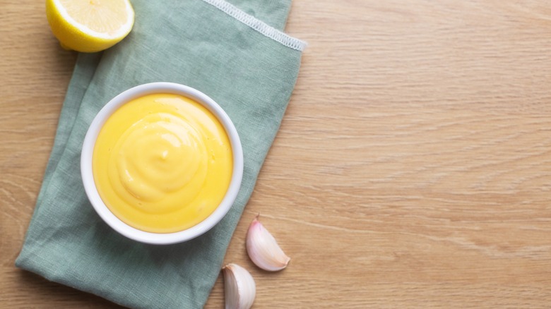 Bowl of aioli on cloth