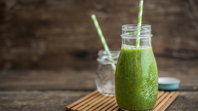 Green juice with straw