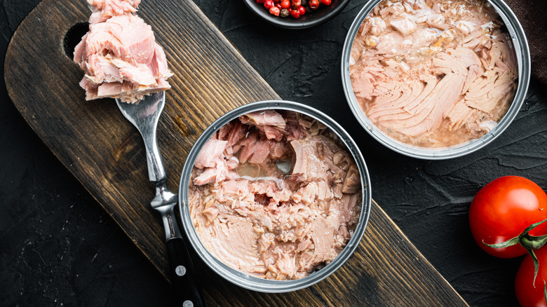 tuna can on wooden board