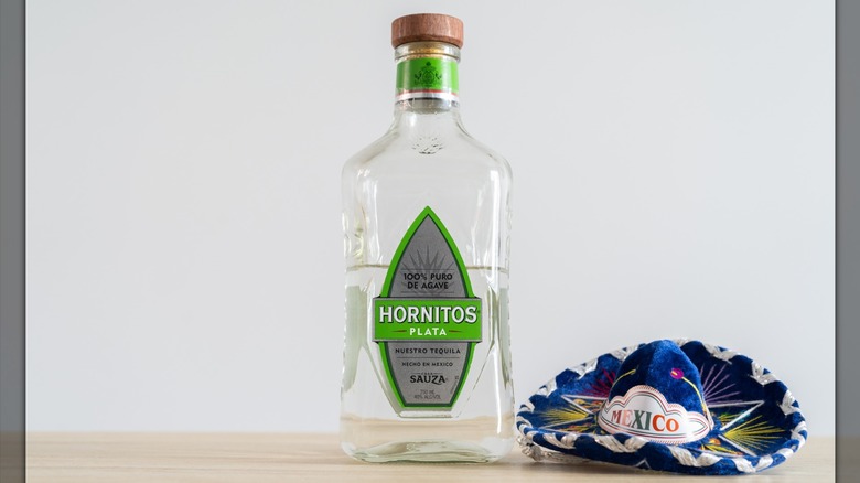 A bottle of Hornitos Plata tequila