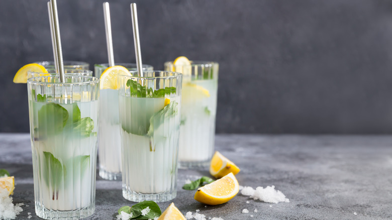 Four mojitos on a bar
