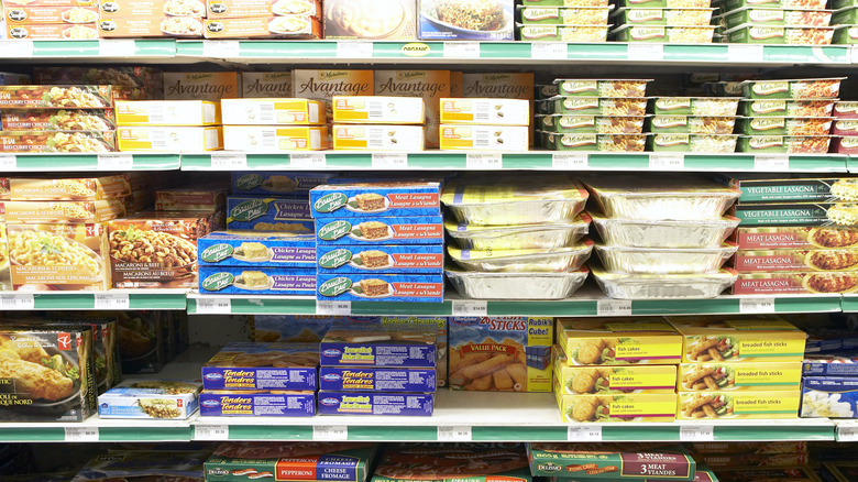 Variety of frozen meals on a grocery store shelf