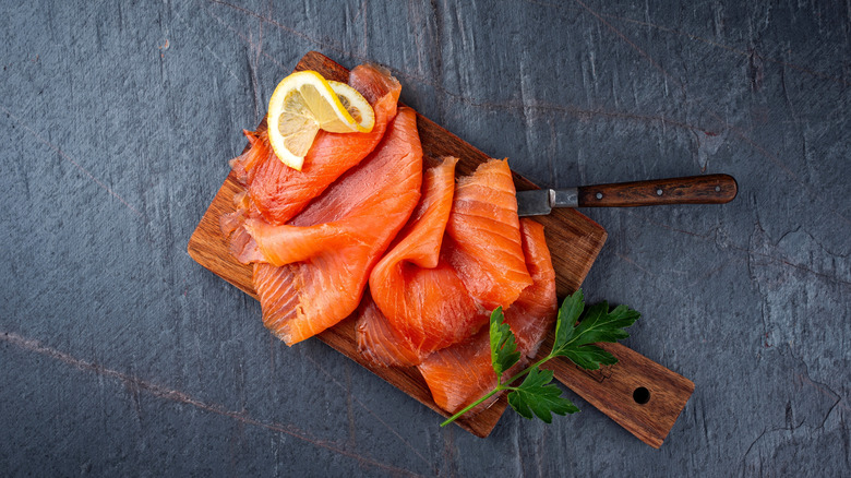 Smoked salmon on wooden board