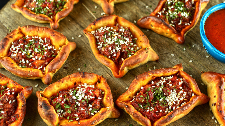 Lebanese sfeeha pies and sauce