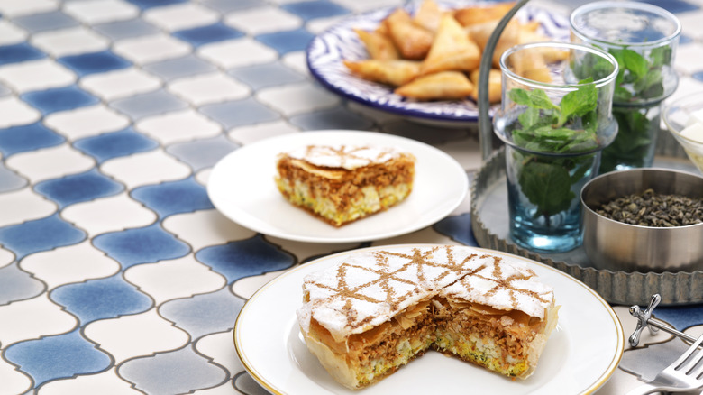 Bastilla with blue tile background