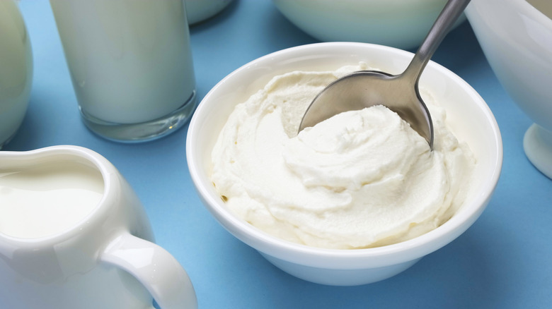 sour cream and jug of milk