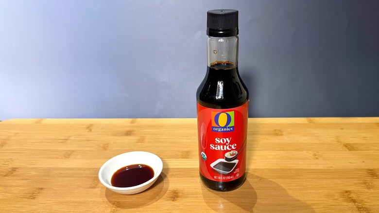 Bottle and small bowl of O Organics soy sauce