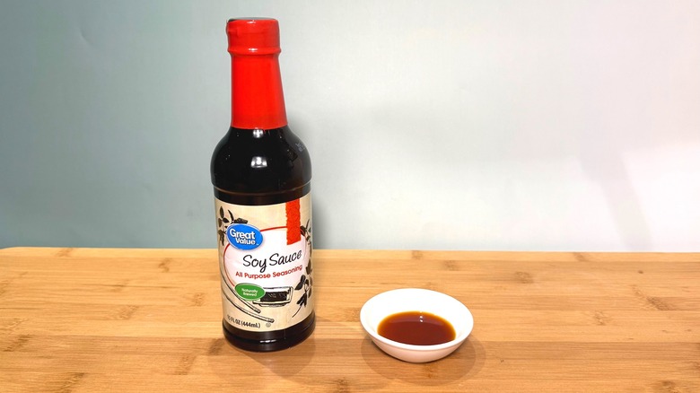 Bottle and small bowl of Great Value soy sauce