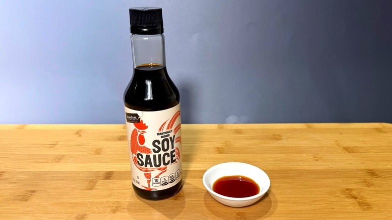 Bottle and small bowl of Signature Select soy sauce