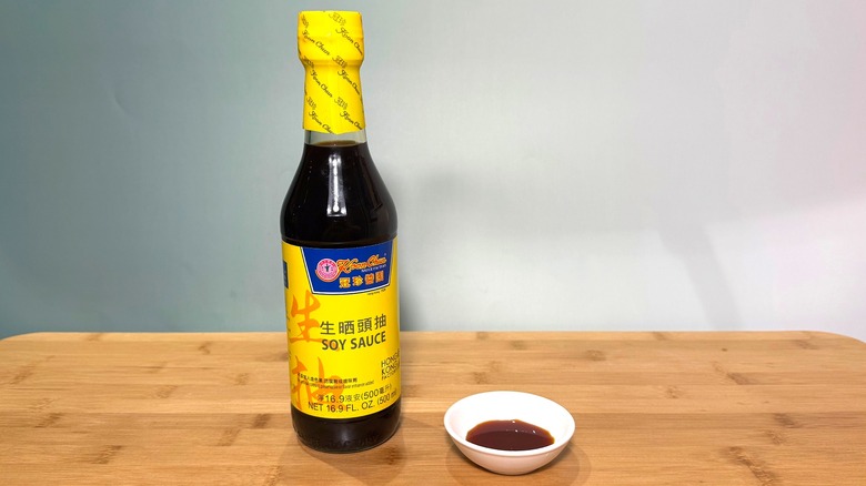 Bottle and small bowl of Koon Chun soy sauce