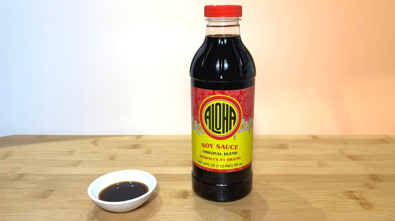 Bottle and small bowl of Aloha soy sauce