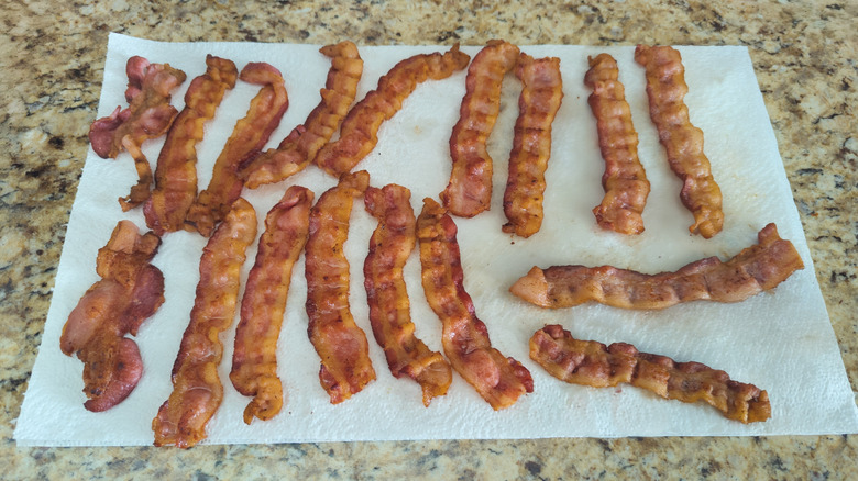 Bacon draining on paper towel