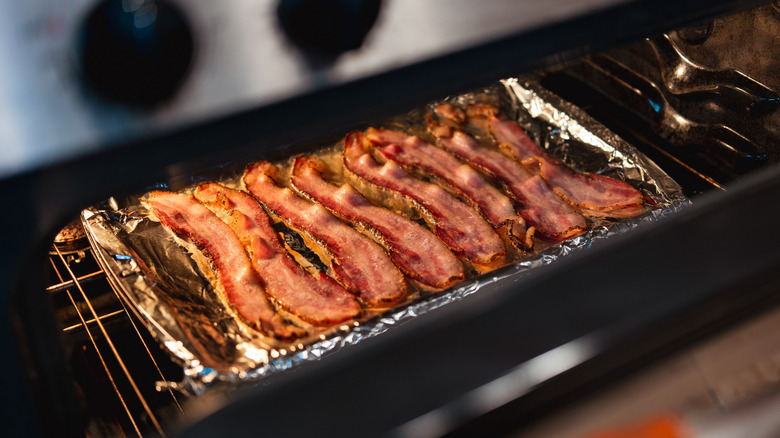 Bacon cooking in an oven